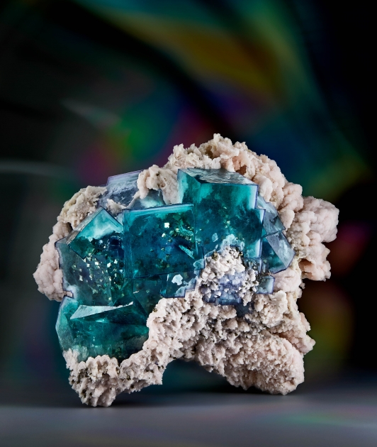Fluorite with Pyrite Inclusions on Manganocalcite
